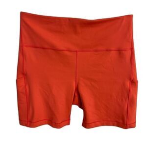Athleta Womens Size 1X Orange Ultimate Stash Pocket 7" Biker Athletic Shorts Gym